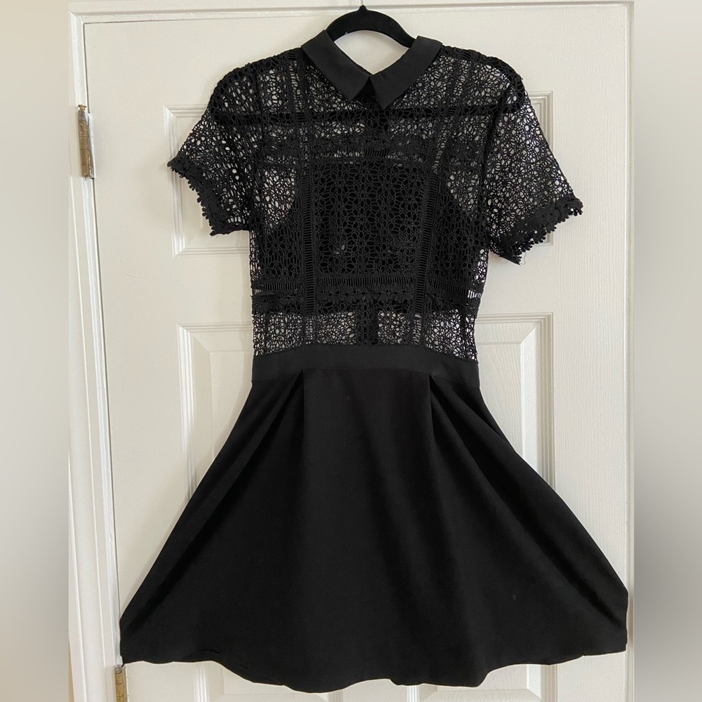 Danity black short dress (above knees) with a collar